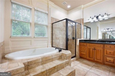 Welcome to 6186 Talmadge Run-an elegant retreat tucked inside on The Governors Towne Club in Georgia - for sale on GolfHomes.com, golf home, golf lot