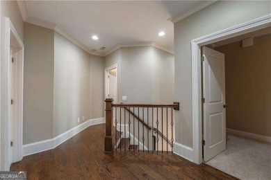 Welcome to 6186 Talmadge Run-an elegant retreat tucked inside on The Governors Towne Club in Georgia - for sale on GolfHomes.com, golf home, golf lot