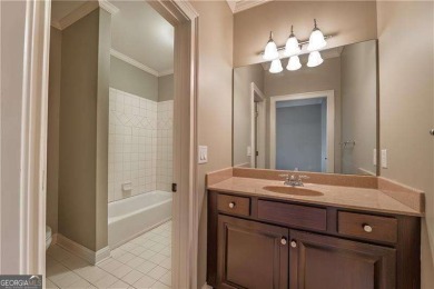 Welcome to 6186 Talmadge Run-an elegant retreat tucked inside on The Governors Towne Club in Georgia - for sale on GolfHomes.com, golf home, golf lot