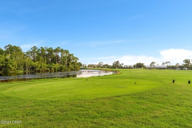 Love the green grass of HOME but not a fan of yard maintenance? on Bay Point Resort Golf Club in Florida - for sale on GolfHomes.com, golf home, golf lot