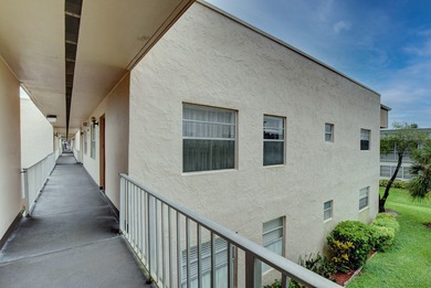 Beautifully remodeled 2nd-floor condo near the entrance with on Kings Point Golf -Flanders Way in Florida - for sale on GolfHomes.com, golf home, golf lot