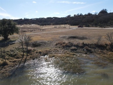 This lot is located on Lake Brownwood very close to the highly on Hideout Golf Club and Resort  in Texas - for sale on GolfHomes.com, golf home, golf lot