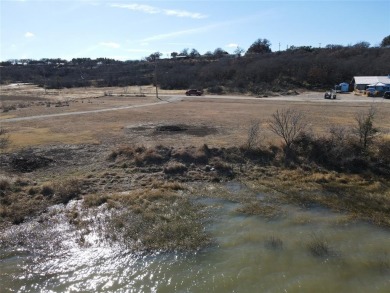 This lot is located on Lake Brownwood very close to the highly on Hideout Golf Club and Resort  in Texas - for sale on GolfHomes.com, golf home, golf lot