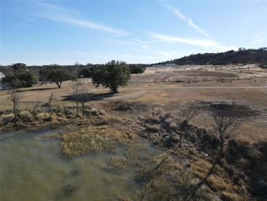 This lot is located on Lake Brownwood very close to the highly on Hideout Golf Club and Resort  in Texas - for sale on GolfHomes.com, golf home, golf lot