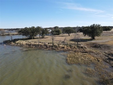 This lot is located on Lake Brownwood very close to the highly on Hideout Golf Club and Resort  in Texas - for sale on GolfHomes.com, golf home, golf lot