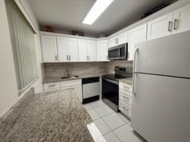 Don't miss this conveniently located updated 1st floor corner on Kings Point Golf - Executive in Florida - for sale on GolfHomes.com, golf home, golf lot
