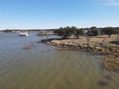 This lot is located on Lake Brownwood very close to the highly on Hideout Golf Club and Resort  in Texas - for sale on GolfHomes.com, golf home, golf lot