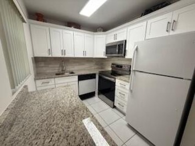 Don't miss this conveniently located updated 1st floor corner on Kings Point Golf - Executive in Florida - for sale on GolfHomes.com, golf home, golf lot