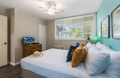 Discover tranquility just moments away from the vibrant heart of on Kona Country Club Golf Course in Hawaii - for sale on GolfHomes.com, golf home, golf lot