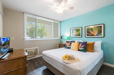 Discover tranquility just moments away from the vibrant heart of on Kona Country Club Golf Course in Hawaii - for sale on GolfHomes.com, golf home, golf lot