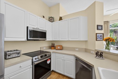 Welcome to this charming 3-bedroom, 2-bath townhouse located in on Ibis Golf and Country Club in Florida - for sale on GolfHomes.com, golf home, golf lot