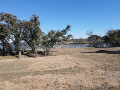 This lot is located on Lake Brownwood very close to the highly on Hideout Golf Club and Resort  in Texas - for sale on GolfHomes.com, golf home, golf lot