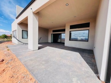 This exquisite estate, perfectly perched to offer panoramic on Lake Powell National Golf Course in Arizona - for sale on GolfHomes.com, golf home, golf lot