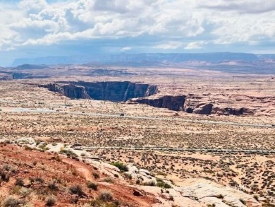 This exquisite estate, perfectly perched to offer panoramic on Lake Powell National Golf Course in Arizona - for sale on GolfHomes.com, golf home, golf lot