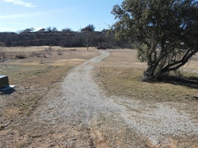 This lot is located on Lake Brownwood very close to the highly on Hideout Golf Club and Resort  in Texas - for sale on GolfHomes.com, golf home, golf lot