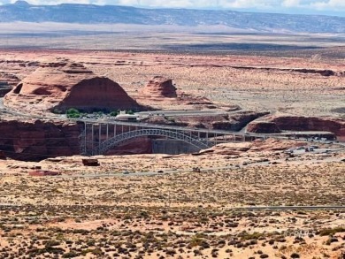 This exquisite estate, perfectly perched to offer panoramic on Lake Powell National Golf Course in Arizona - for sale on GolfHomes.com, golf home, golf lot