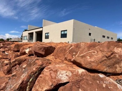 This exquisite estate, perfectly perched to offer panoramic on Lake Powell National Golf Course in Arizona - for sale on GolfHomes.com, golf home, golf lot