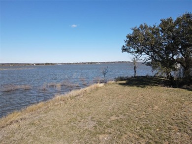 This lot is located on Lake Brownwood very close to the highly on Hideout Golf Club and Resort  in Texas - for sale on GolfHomes.com, golf home, golf lot