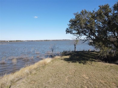 This lot is located on Lake Brownwood very close to the highly on Hideout Golf Club and Resort  in Texas - for sale on GolfHomes.com, golf home, golf lot