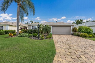 This meticulously maintained two-bedroom plus den, two-bathroom on University Park Country Club in Florida - for sale on GolfHomes.com, golf home, golf lot