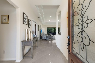 This meticulously maintained two-bedroom plus den, two-bathroom on University Park Country Club in Florida - for sale on GolfHomes.com, golf home, golf lot