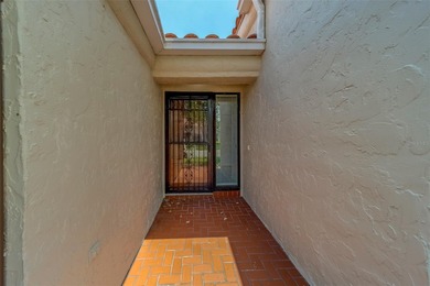 Welcome home to this light and airy 2 bedroom/2 bathroom corner on Mainlands Golf Club in Florida - for sale on GolfHomes.com, golf home, golf lot