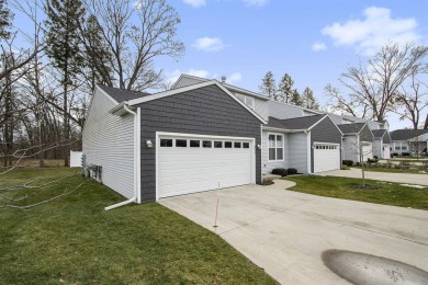 Superior Portage location for this beautiful newer condominium on The Moors Golf Club in Michigan - for sale on GolfHomes.com, golf home, golf lot