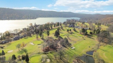 Discover the perfect blend of serene lake living and modern on Lake Mohawk Golf Club in New Jersey - for sale on GolfHomes.com, golf home, golf lot