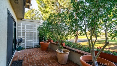 On a premium corner lot at the end of a quiet cul-de-sac, this on Rancho San Joaquin Golf Course in California - for sale on GolfHomes.com, golf home, golf lot