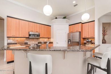 Welcome to this meticulously maintained custom home designed by on Halifax Plantation Golf Club in Florida - for sale on GolfHomes.com, golf home, golf lot