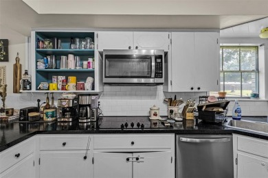 Welcome to this charming two-story brick home situated on a on Cameron Country Club in Texas - for sale on GolfHomes.com, golf home, golf lot