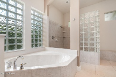 Welcome to this meticulously maintained custom home designed by on Halifax Plantation Golf Club in Florida - for sale on GolfHomes.com, golf home, golf lot