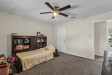 Welcome to this charming two-story brick home situated on a on Cameron Country Club in Texas - for sale on GolfHomes.com, golf home, golf lot