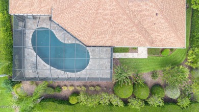 Welcome to this meticulously maintained custom home designed by on Halifax Plantation Golf Club in Florida - for sale on GolfHomes.com, golf home, golf lot
