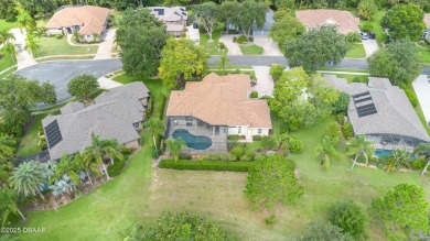 Welcome to this meticulously maintained custom home designed by on Halifax Plantation Golf Club in Florida - for sale on GolfHomes.com, golf home, golf lot
