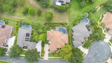 Welcome to this meticulously maintained custom home designed by on Halifax Plantation Golf Club in Florida - for sale on GolfHomes.com, golf home, golf lot