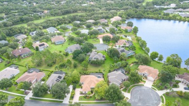 Welcome to this meticulously maintained custom home designed by on Halifax Plantation Golf Club in Florida - for sale on GolfHomes.com, golf home, golf lot