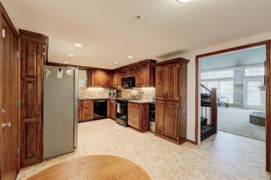 From the moment you walk into this beautiful condo, you will on Golf Club At Surrey Hills in Oklahoma - for sale on GolfHomes.com, golf home, golf lot