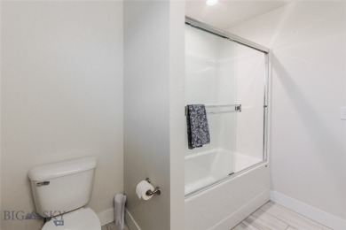 Discover modern Montana living at 817 Milky Way Drive Unit B in on Cottonwood Hills Golf Course - Cottonwood Hills in Montana - for sale on GolfHomes.com, golf home, golf lot