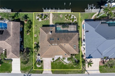 WATERFRONT HOME IN PGI ON OVERSIZED LOT W/SAILBOAT ACCESS - This on Saint Andrews South Golf Club in Florida - for sale on GolfHomes.com, golf home, golf lot
