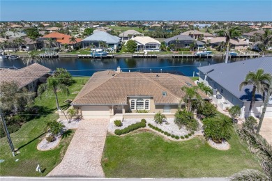 WATERFRONT HOME IN PGI ON OVERSIZED LOT W/SAILBOAT ACCESS - This on Saint Andrews South Golf Club in Florida - for sale on GolfHomes.com, golf home, golf lot