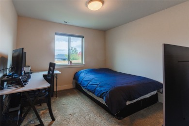 Discover modern Montana living at 817 Milky Way Drive Unit B in on Cottonwood Hills Golf Course - Cottonwood Hills in Montana - for sale on GolfHomes.com, golf home, golf lot