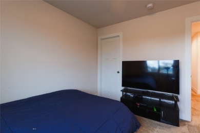 Discover modern Montana living at 817 Milky Way Drive Unit B in on Cottonwood Hills Golf Course - Cottonwood Hills in Montana - for sale on GolfHomes.com, golf home, golf lot