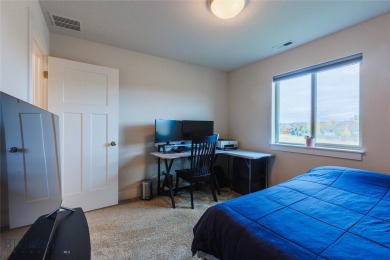 Discover modern Montana living at 817 Milky Way Drive Unit B in on Cottonwood Hills Golf Course - Cottonwood Hills in Montana - for sale on GolfHomes.com, golf home, golf lot