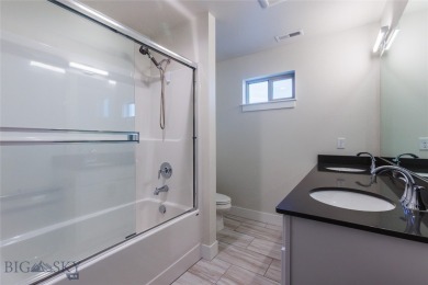 Discover modern Montana living at 817 Milky Way Drive Unit B in on Cottonwood Hills Golf Course - Cottonwood Hills in Montana - for sale on GolfHomes.com, golf home, golf lot