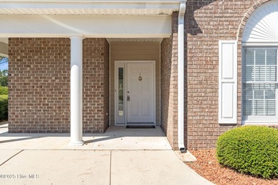 Welcome to 'easy living' in the highly sought-after Sea Trail on Sea Trail Golf Resort in North Carolina - for sale on GolfHomes.com, golf home, golf lot