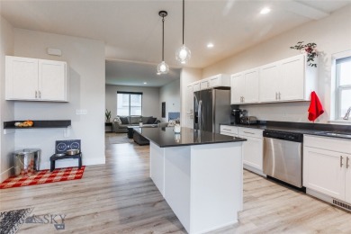 Discover modern Montana living at 817 Milky Way Drive Unit B in on Cottonwood Hills Golf Course - Cottonwood Hills in Montana - for sale on GolfHomes.com, golf home, golf lot