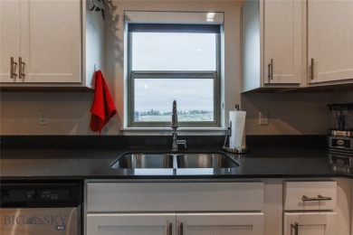 Discover modern Montana living at 817 Milky Way Drive Unit B in on Cottonwood Hills Golf Course - Cottonwood Hills in Montana - for sale on GolfHomes.com, golf home, golf lot