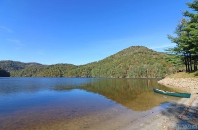 Looking for a move-in ready mountain home? This cottage is in on Bear Lake Golf Club in North Carolina - for sale on GolfHomes.com, golf home, golf lot