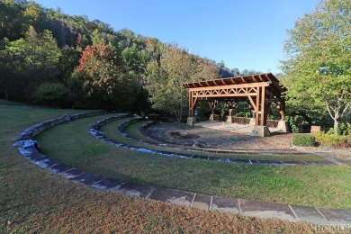 Looking for a move-in ready mountain home? This cottage is in on Bear Lake Golf Club in North Carolina - for sale on GolfHomes.com, golf home, golf lot